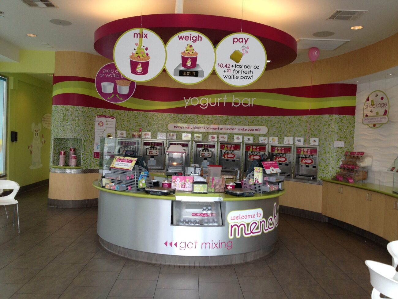 The bright self-serve yogurt bar inside a Menchie's store